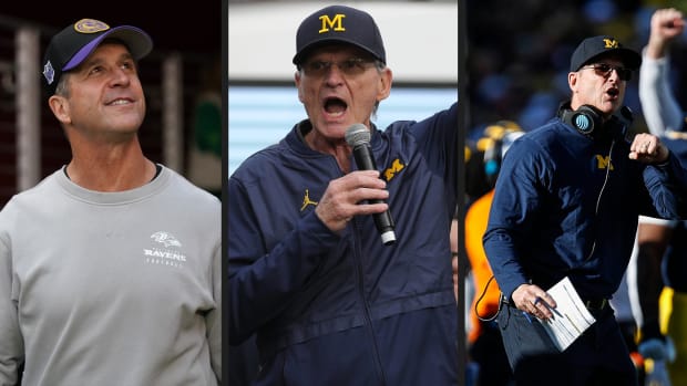Image of Ravens head coach John Harbaugh, Jack Harbaugh and Michigan head coach Jim Harbaugh